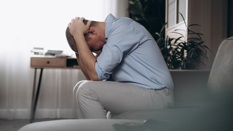 stock image of depressed man