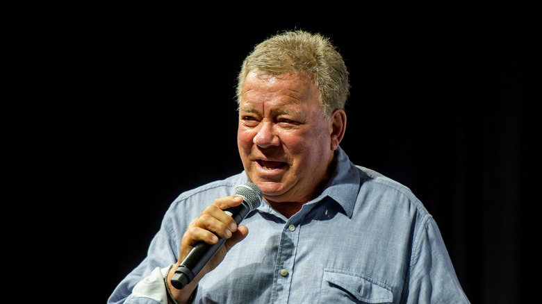 William Shatner talking into mic