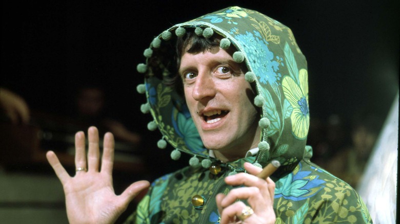 Jimmy Savile in green hooded robe