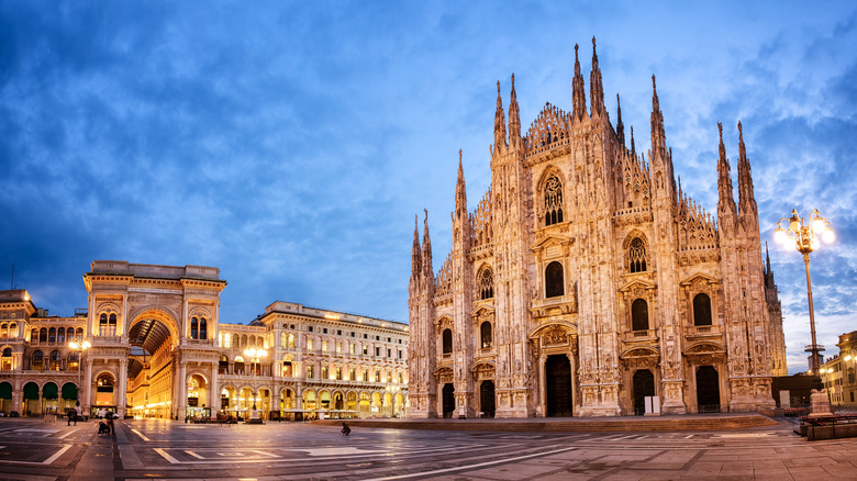 Street lights shining near Duomo di Milano