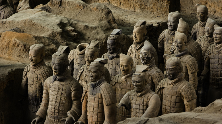 Small group of Terracotta Warrior in dirt excavation pit