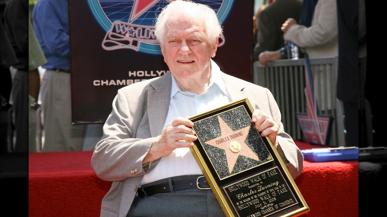 Charles Durning holding Hollywood Star