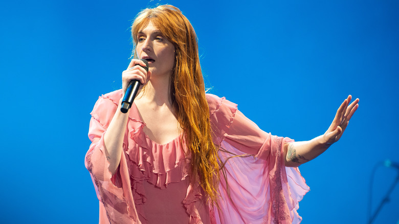 Florence Welch of Florence and the Machine singing onstage