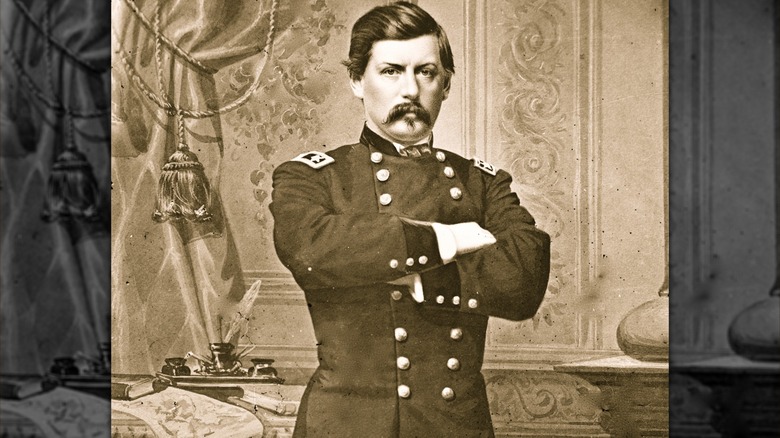 George McClellan standing arms folded