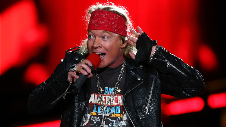 Guns N' Roses' Axl Rose cupping his ears and singing in Perth, Australia in 2017