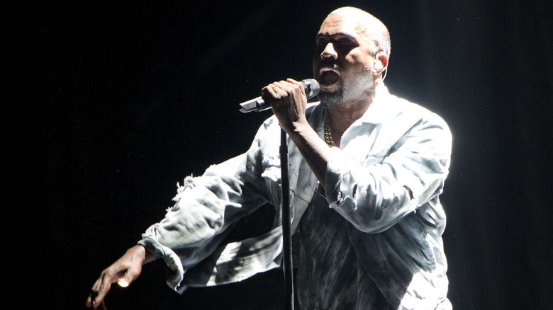 Kanye West on stage at the Bonnaroo festival in 2014