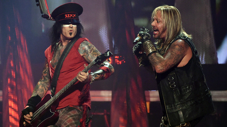 Motley Crue's Nikki Sixx and Vince Neil performing at the iHeartRadio Music Festival in 2014