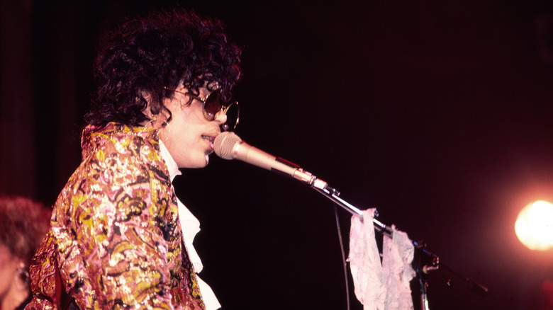 Prince singing on stage at the Ritz club in 1981