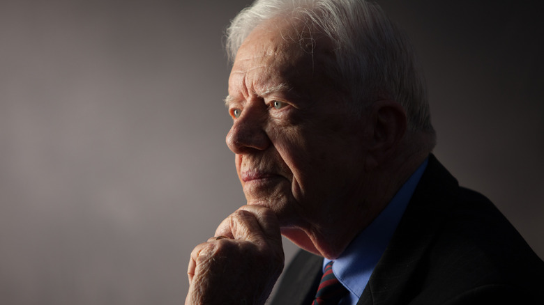 Jimmy Carter profile in dramatic lighting