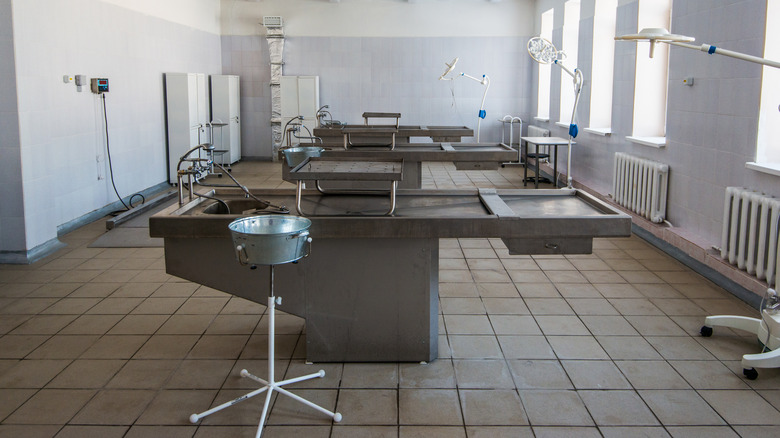 empty autopsy tables in morgue