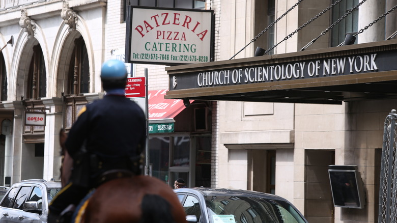 Church of Scientology in New York building horse in foreground