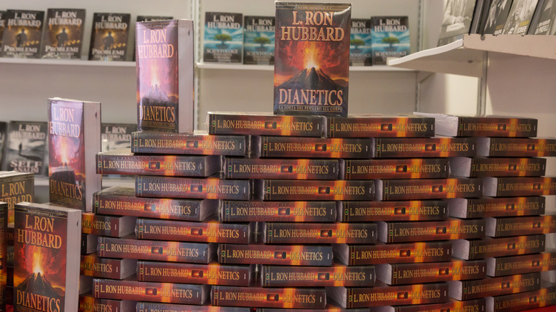 Large pile of Dianetics books