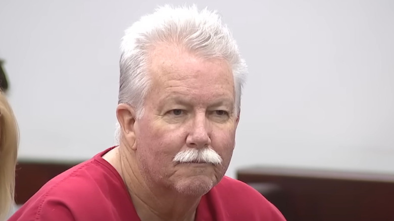 Donald Santini in court red jumpsuit