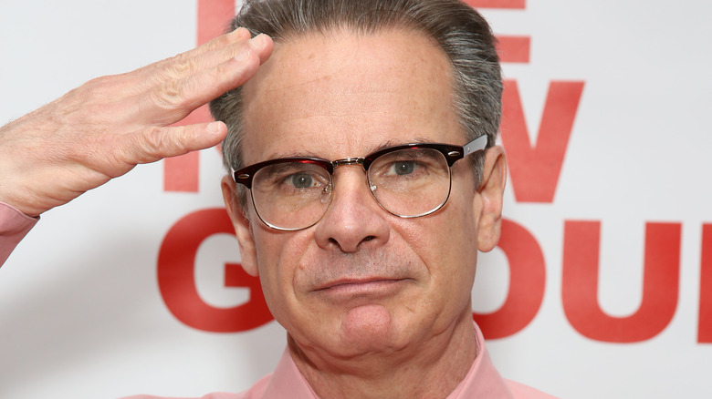 peter scolari pink shirt saluting