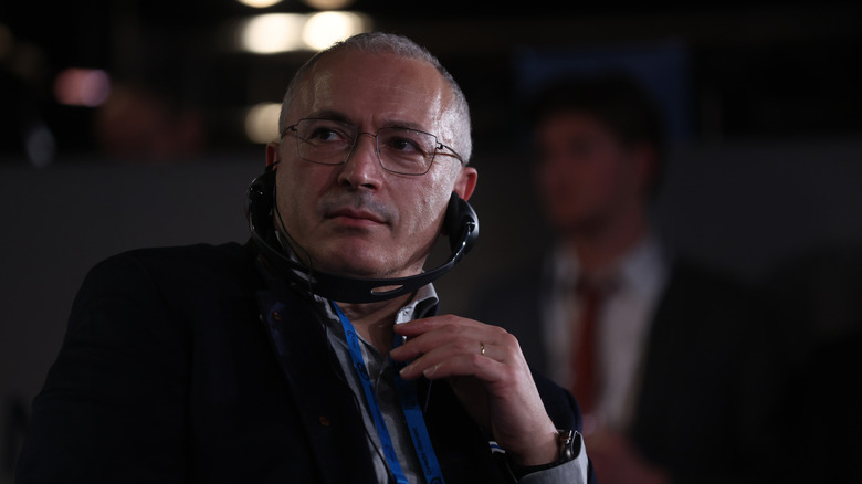 Mikhail Khodorkovsky listening at conference