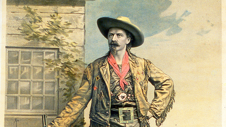 Buffalo Bill Cody posing with a rifle