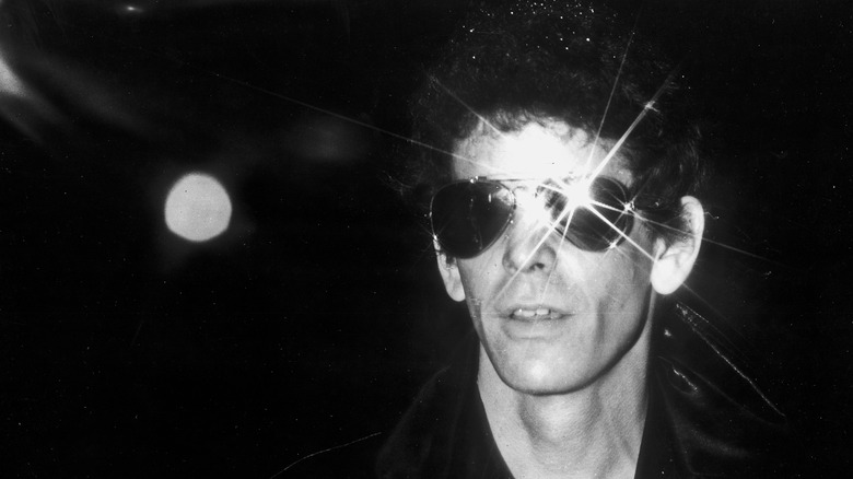 Lou Reed wearing sunglasses