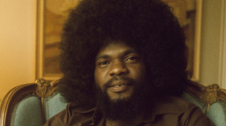 Billy Preston portrait afro chair smiling