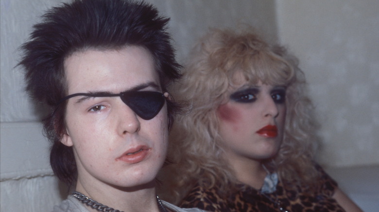 Sid and Nancy sitting next to each other