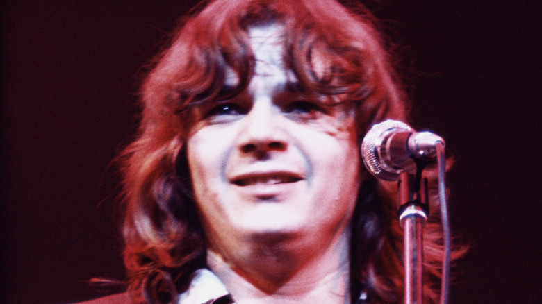 Steve Miller playing live mic smiling