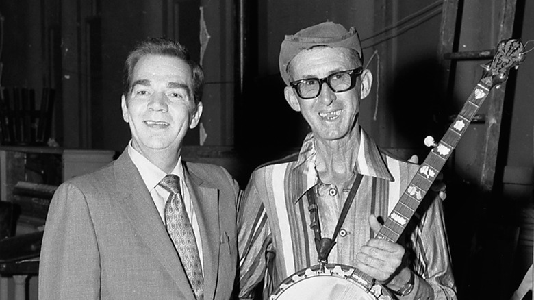 David "Stringbean" Akeman posing for a picture with his banjo