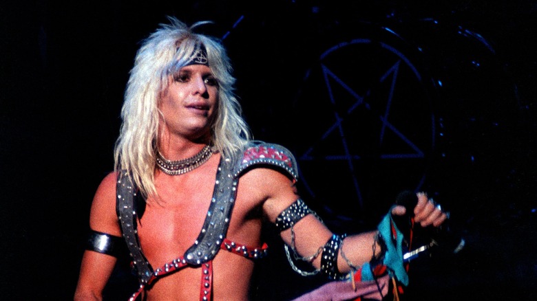 Vince Neil of Motley Crue singing on stage