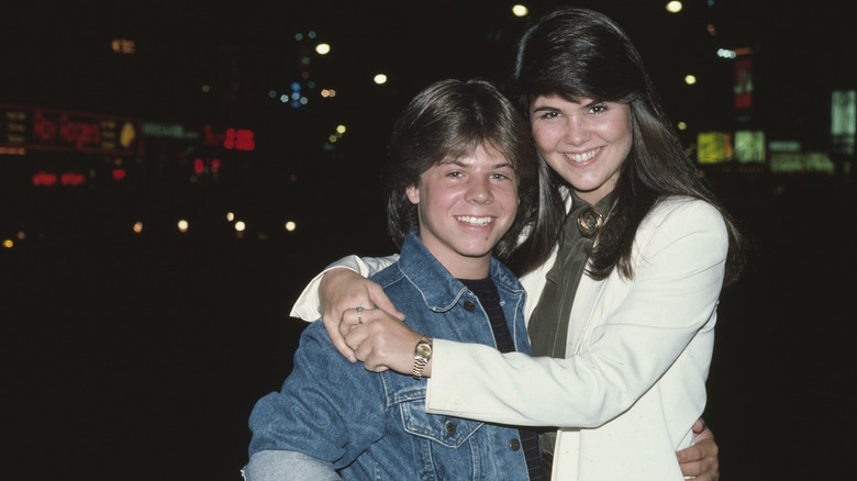 Adam Rich hugging Lori Loughlin 