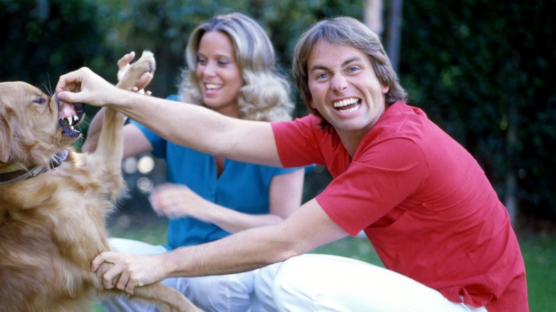 John Ritter smiling red shirt