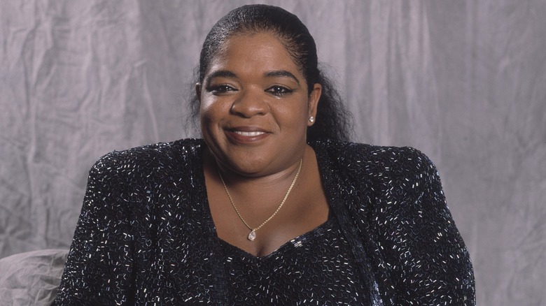 Nell Carter black dress smiling