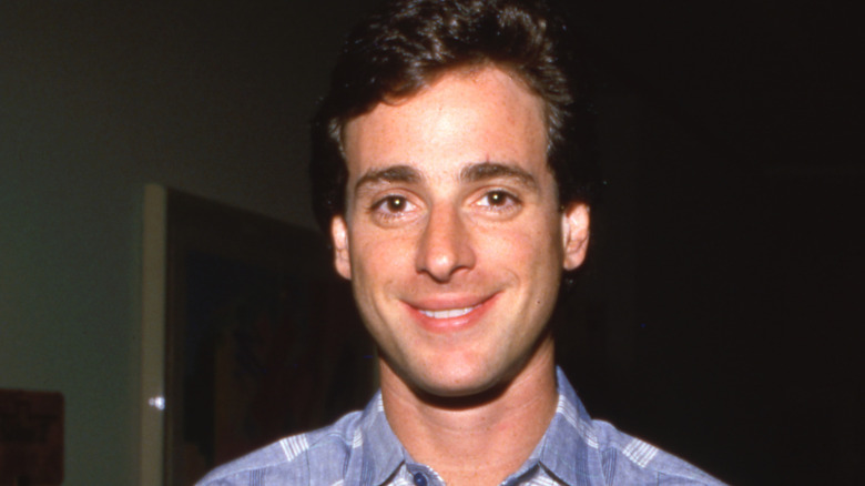 Bob Saget smiling blue shirt