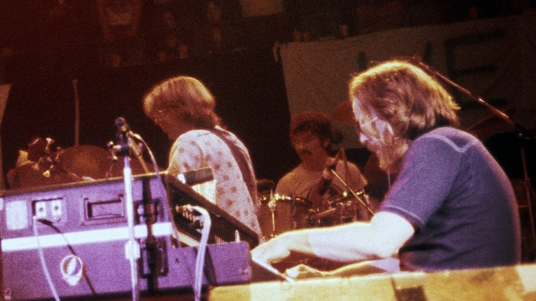 Keith Godchaux playing keyboards onstage