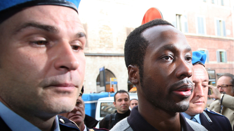 Rudy Guede outside the courtroom in 2009