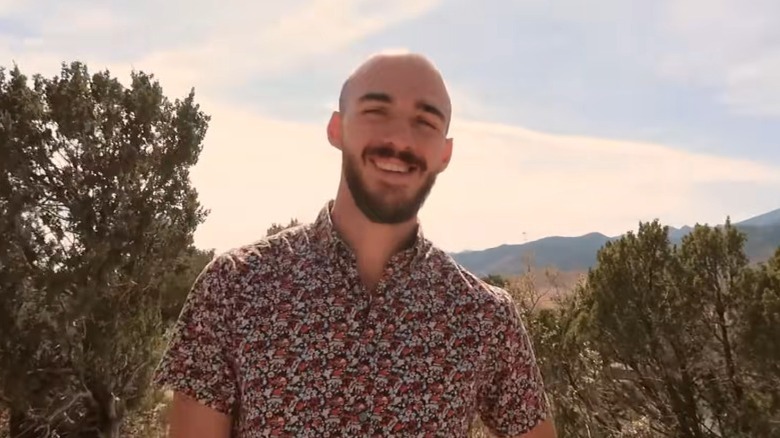 Brian Laundrie smiling in the wilderness