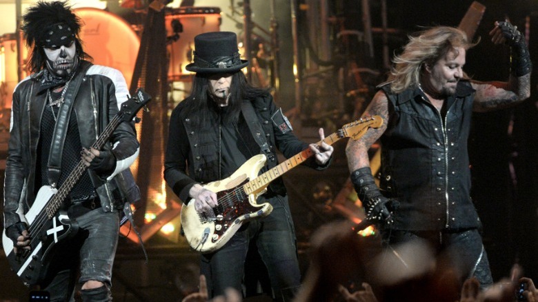 Nikki Sixx, Mick Mars, Vince Neil, onstage