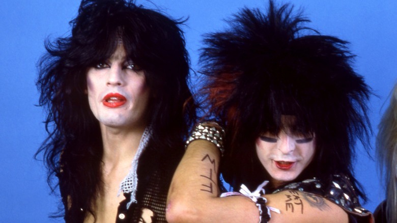 Tommy Lee and Nikki Sixx, smiling