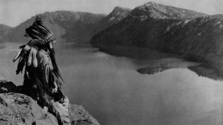 Klamath man overlooks crater lake