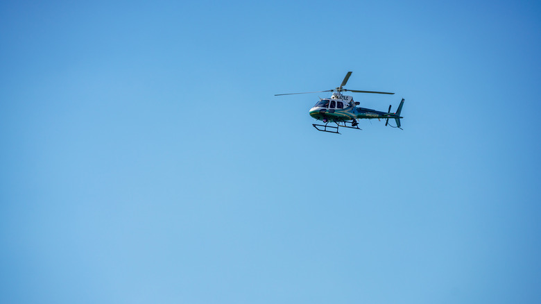 Helicopter against blue sky