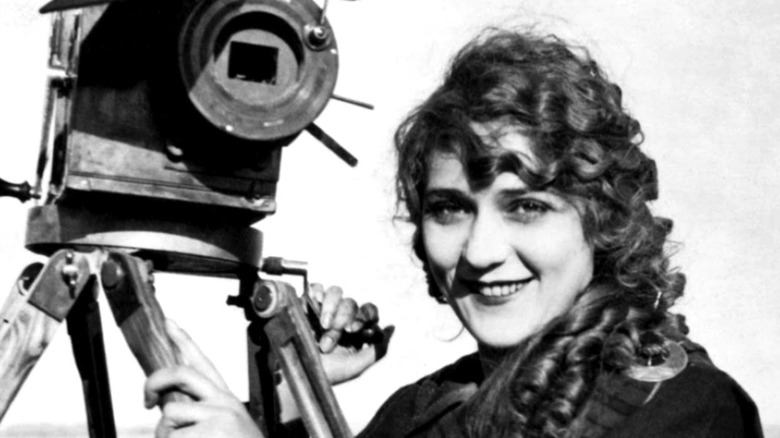 Mary Pickford holds vintage camera