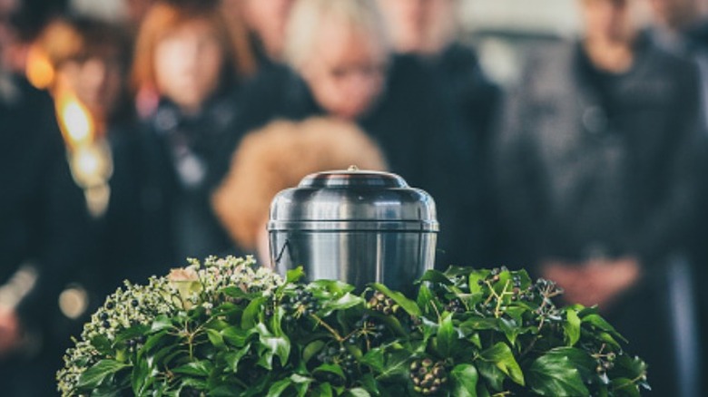 An urn sits in a reef