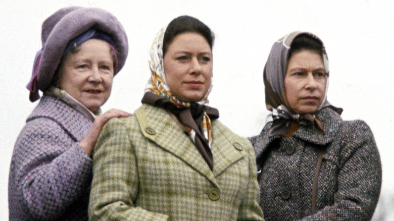 The queen mother, Margaret, and Elizabeth II stand together