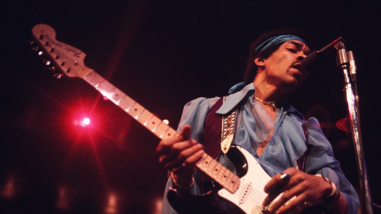 Jimi Hendrix performing