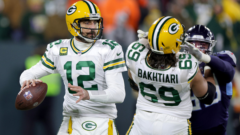 Aaron Rodgers throwing a football