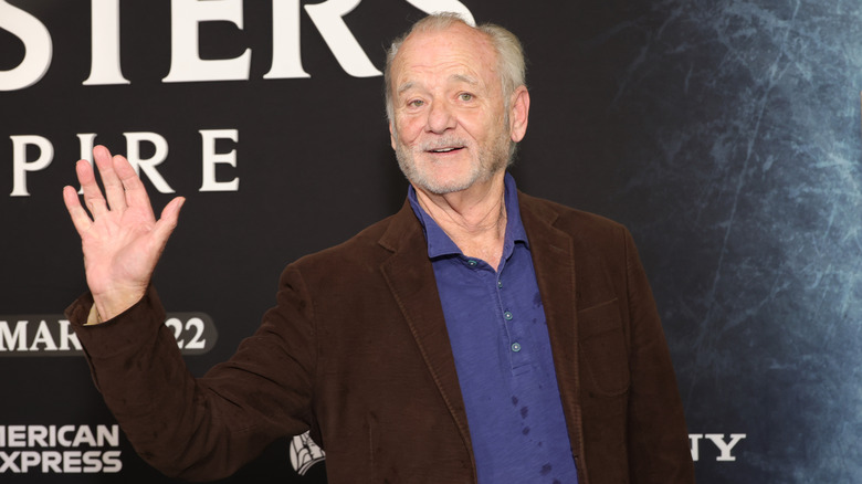 Bill Murray smiling waving at event