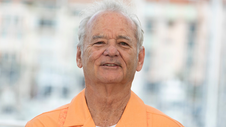 Bill Murray smiling orange shirt