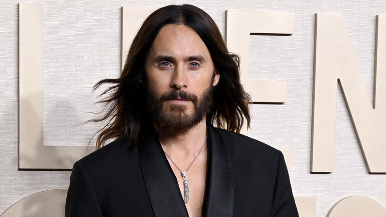 Jared Leto black jacket beard neutral at event