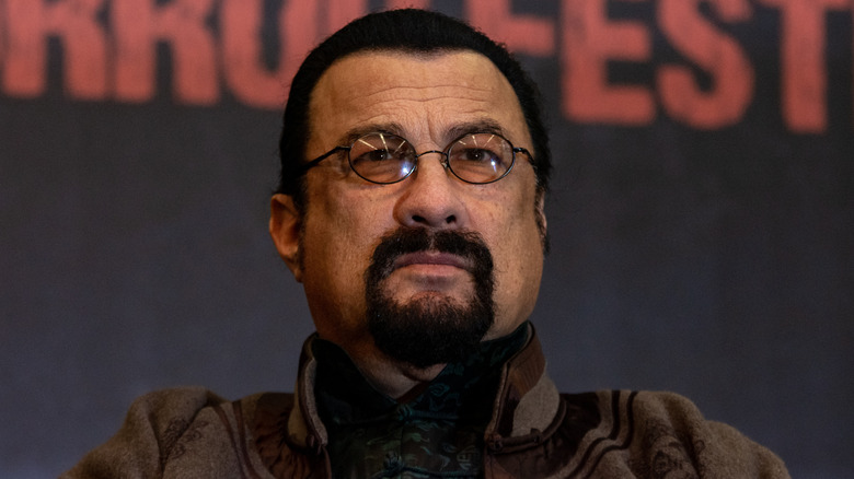 Steven Seagal goatee glasses at event