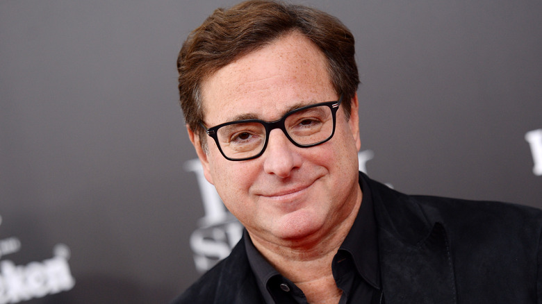 bob saget smirking