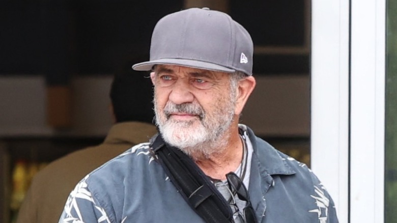 Mel Gibson grey beard and ballcap outdoors