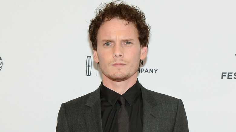 Anton Yelchin black suit tie at event