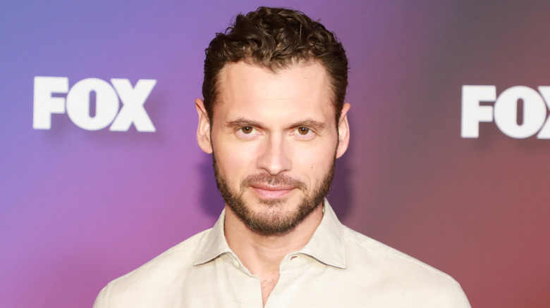 Adan Canto goatee tan shirt at Fox event